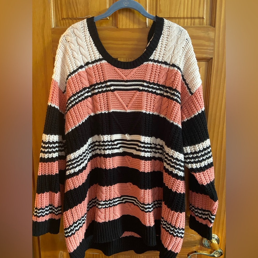 Cream, pink and black stripped sweater with “bow tie” back